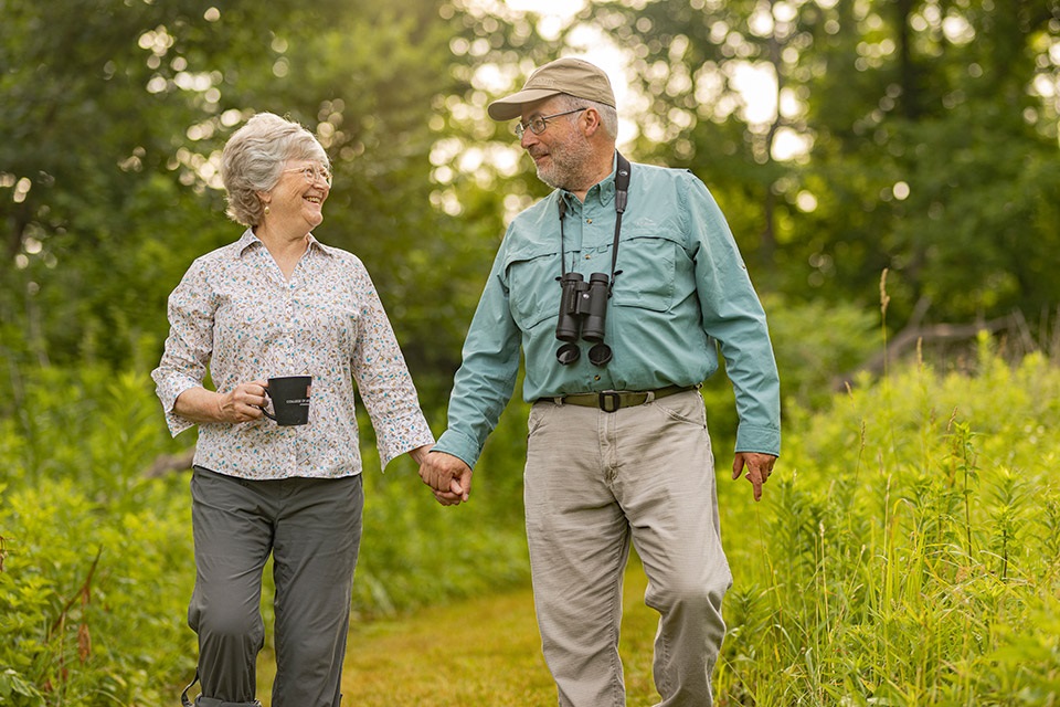 Larry and Elaine enjoy bird watching and exploring their land which doubles as a nature preserve.