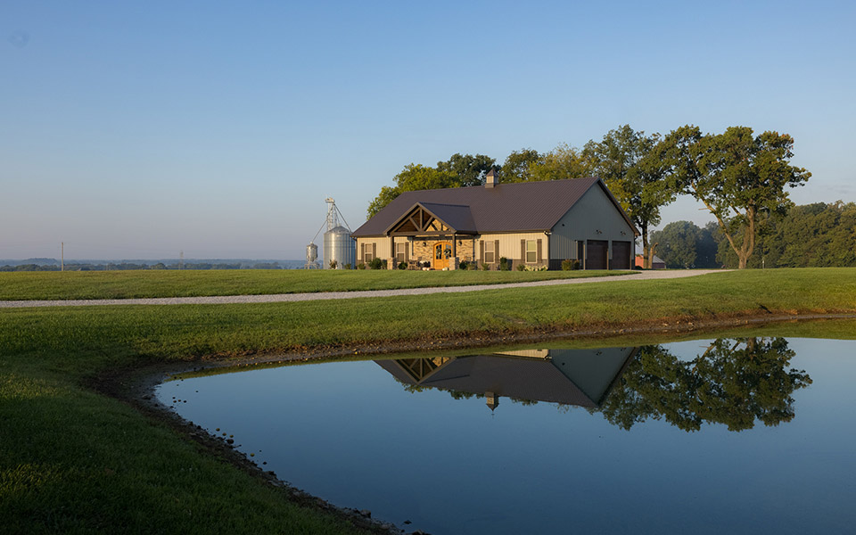 A pond in front of a newly built rural home in Tennessee.