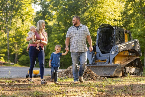 Richmond Family walk their lot loan location