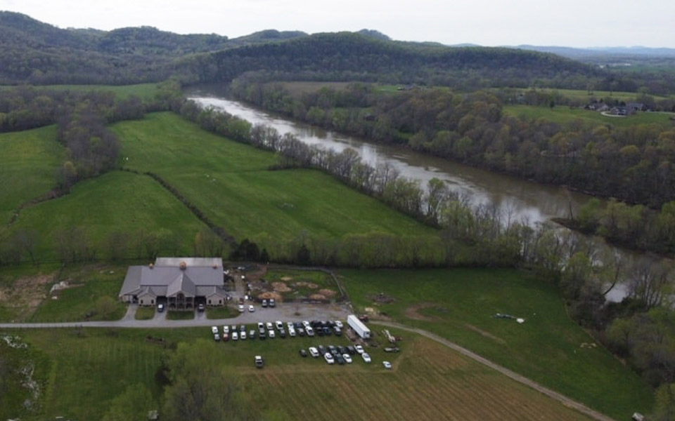 Aerial view of one of the newly built ranches in Tennessee located next to a river.